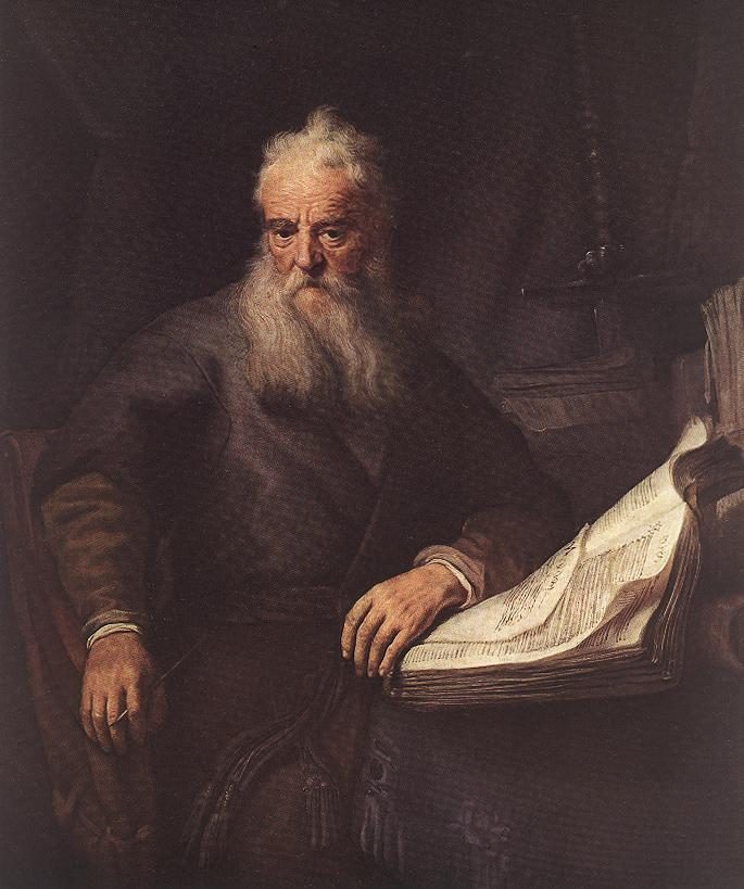 The Apostle Paul, by Rembrandt: an old man with a white beard beside an open book.