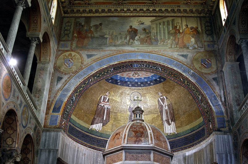 The apse of Sant’Agnese fuori le Mura, Rome: a golden mosaic above the altar, framed by a great arch.