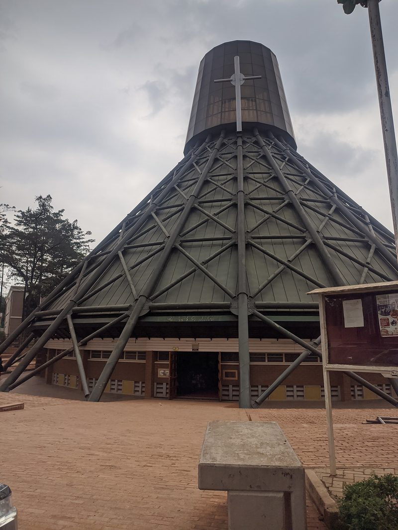 The Basilica of the Uganda Martyrs at Namugongo: a tall cone of steel struts, shaped like a traditional African hut.