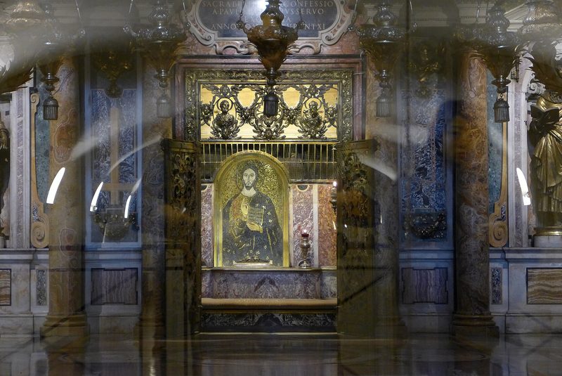 The Niche of the Pallia in the Vatican Grottoes, directly above the place venerated as Peter’s grave: a gold mosaic of Christ behind a bronze grille.